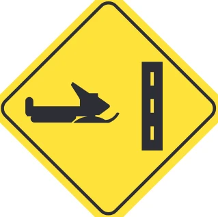 Motorized snow vehicles crossing