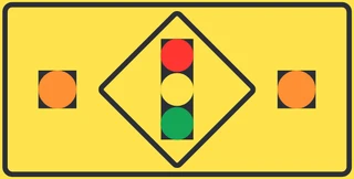 Stop at traffic lights ahead when yellow lights flashing sign from the Driver’s Guide