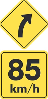 Recommended maximum speed through this curve under ideal driving conditions sign from the Driver’s Guide