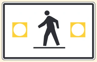 Pedestrian crossing sign with yellow lights