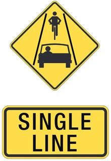 Single line – cyclists may use the full lane